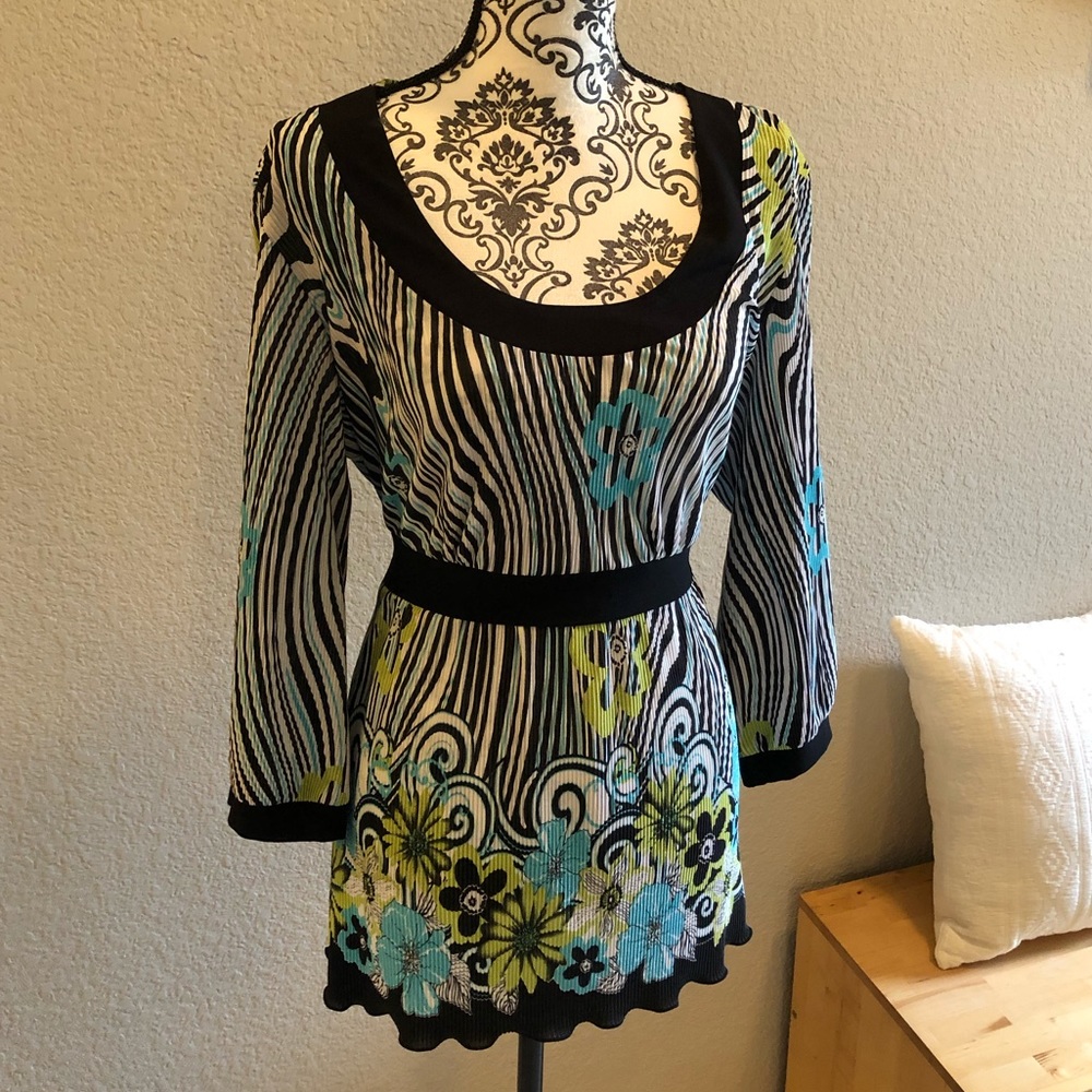 Beautiful pleated top with floral pattern